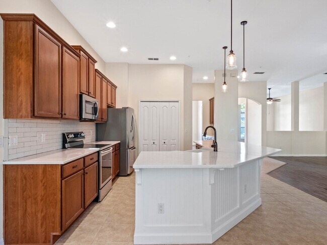Building Photo - Spacious 4-Bedroom Pool Home with 3 Full B...