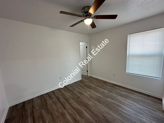 Building Photo - Spacious and updated 2 bedroom 2 bathroom apartment for rent. Central heat and air, granite count...