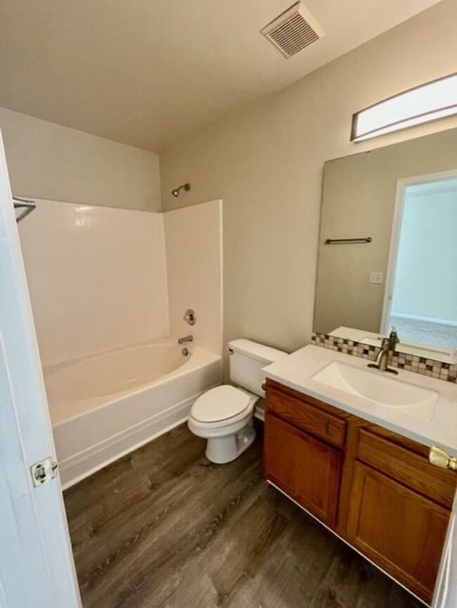 Building Photo - Must see this 4 bedroom 2.5 bath townhouse...