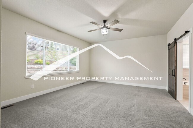 Building Photo - Main Floor Primary Home in Flying Horse with 5 Bedrooms, Gourmet Kitchen, Finished Basement & 4-C...