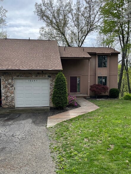 Front exterior with garage space - 10241 Hightower Ct