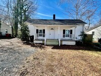 Building Photo - Must see this adorable 2 bedroom, 1 bathro...