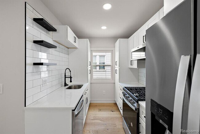 Building Photo - 308-310 East Harry Ave