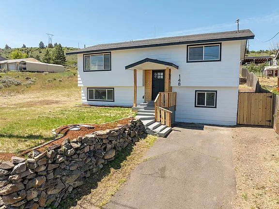 Building Photo - "Charming 5-Bed Sanctuary with Cozy Fireplace on South Rogers Street!"