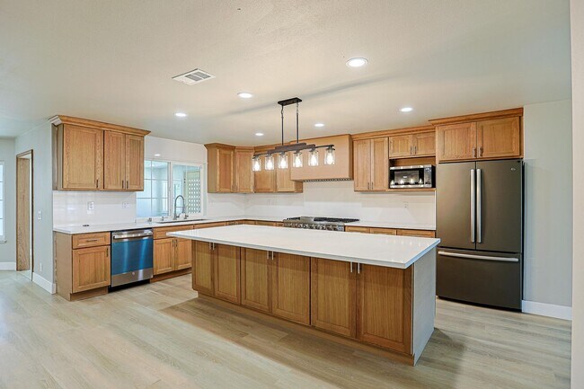 Building Photo - 9909 Merced River Ave