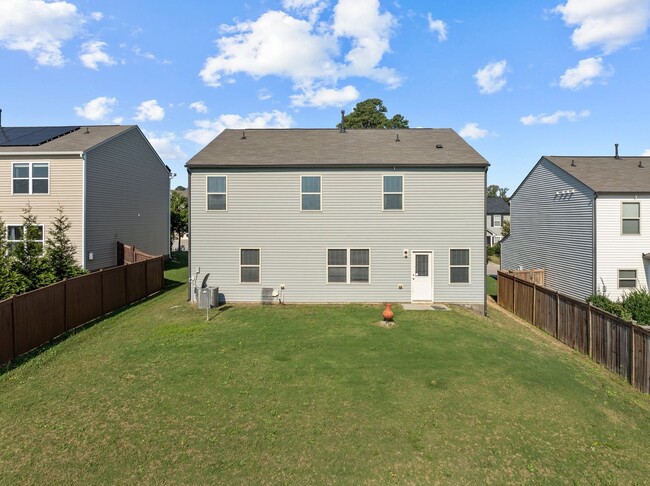 Building Photo - Spacious 5 Bedroom Home with 2-Car Garage,...