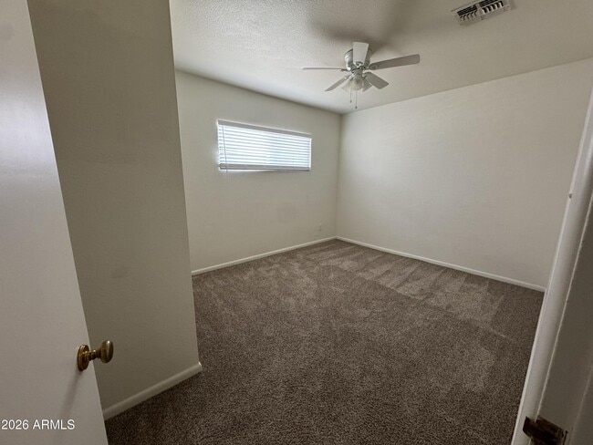 Building Photo - 5444 E Pinchot Ave