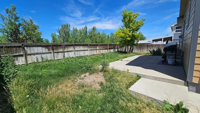 Building Photo - SPACIOUS HOME WITH FINISHED BASEMENT IN NORTH RANGE VILLAGE!