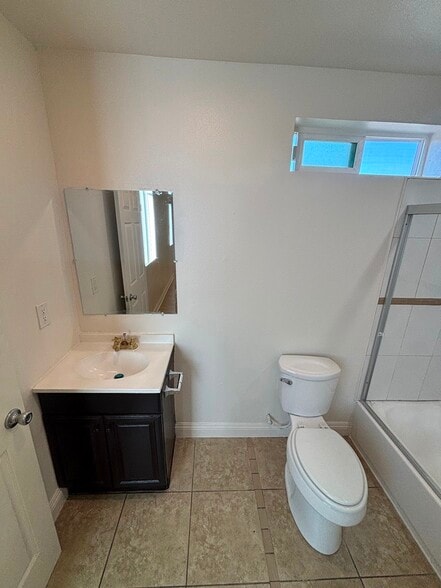 Building Photo - 1029 W 65th Pl