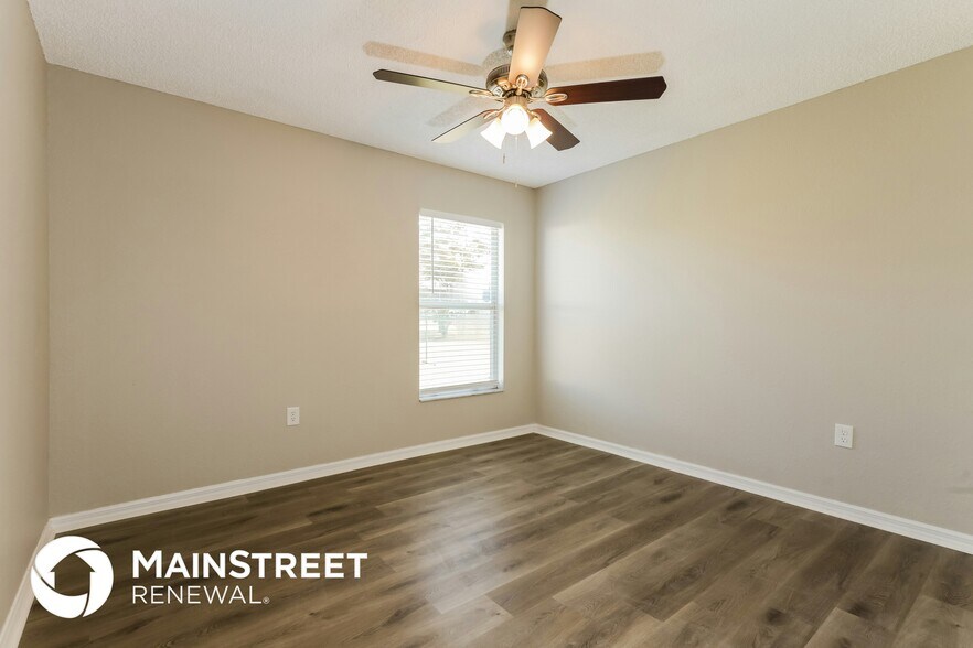 Building Photo - 2704 Champion Ridge Dr