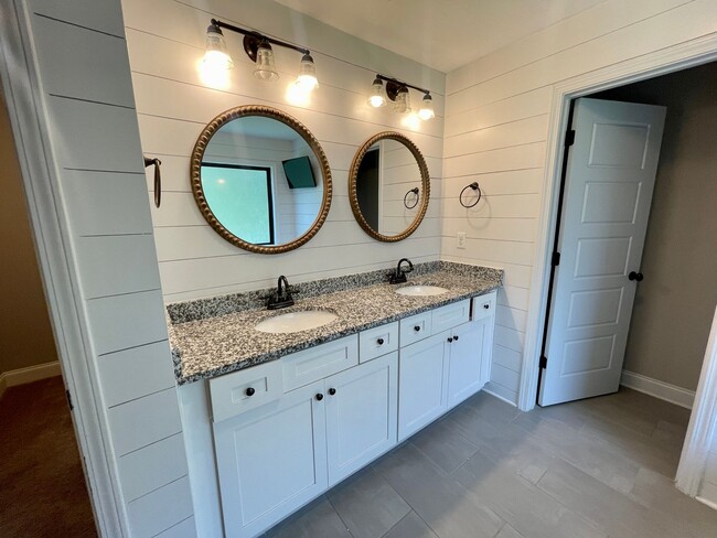 Building Photo - Whispering Pines 4 Bedroom 3.5 Bathroom Re...