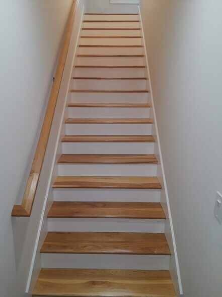 Stairs to the living area & kitchen - 8814 N Edison St