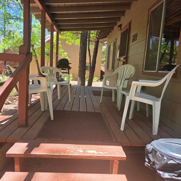 Cabin 7 Porch - 165 E White Mountain Blvd