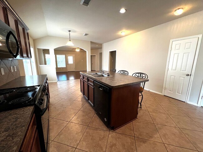 Building Photo - Charming 3-Bedroom Home with Modern Kitchen and Spacious Backyard