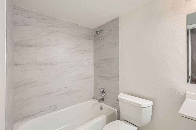 Building Photo - MOVE-IN SPECIAL ($250): Spacious Condo wit...