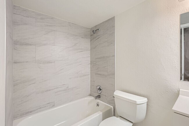 Building Photo - MOVE-IN SPECIAL ($500): Spacious Condo wit...