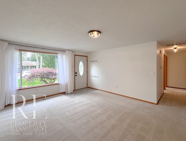 Building Photo - Bright & Spacious Single-Level Home with Dual Living Areas