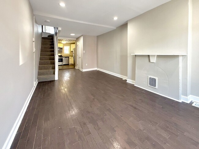 Building Photo - Charming Baltimore Rowhome with Private Backyard & Modern Updates