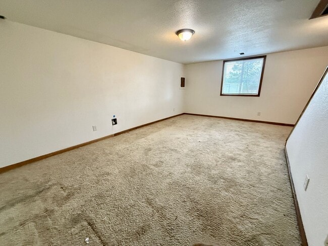 Building Photo - Beautifully Updated 5 Bedroom Rockrimmon Ranch Home Backing to Open Space