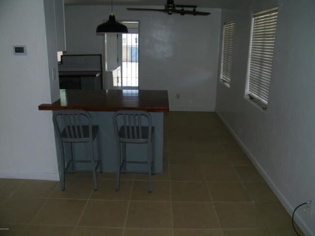 Building Photo - Charming Tucson 3-Bedroom Home with Spacio...