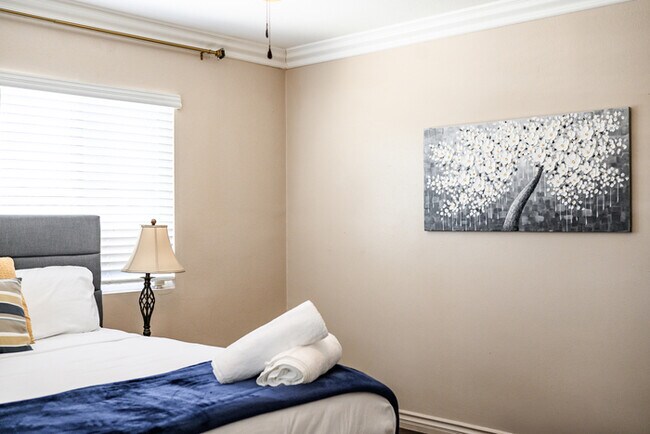Building Photo - Fully Furnished 2BR Home with Crib — Mid-T...