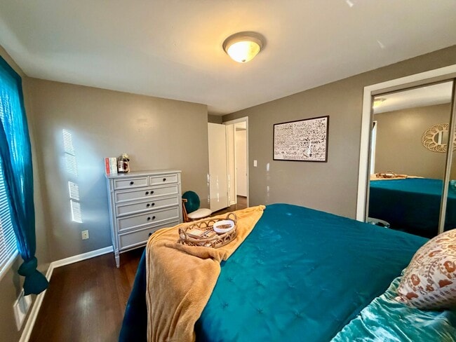 Building Photo - {7710} Prairie Village Split Level with Two Car Garage + Two Full Bathrooms + Hardwood Floors + U...