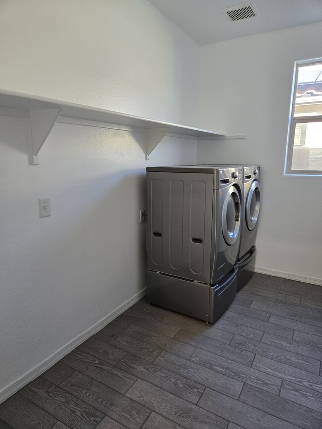 Expdnded view of laundry area - 19975 W Glenrosa Ave