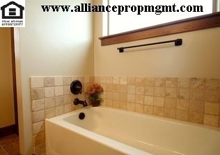 Building Photo - Centrally-located 3 bedroom home with paved RV parking.