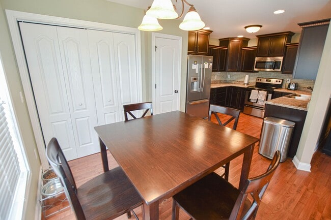 Building Photo - Pet Friendly Three Bedroom with Bonus!