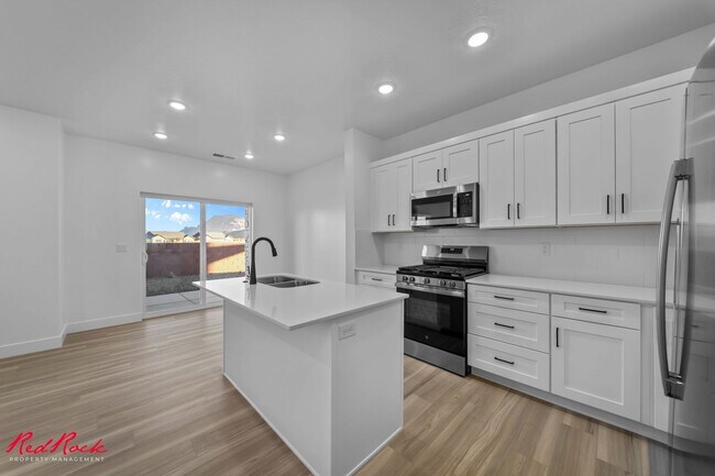 Building Photo - Newly Built 4 Bedroom Townhome!