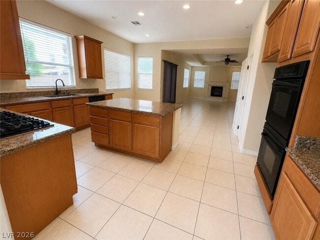 Building Photo - 8059 Dolce Flore Ave