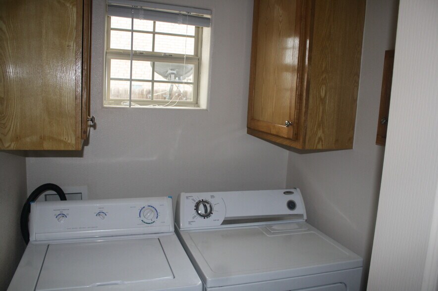 laundry room with washer and dryer - 1503 West Fig Avenue
