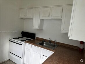 Building Photo - 148 NW 40th Ct