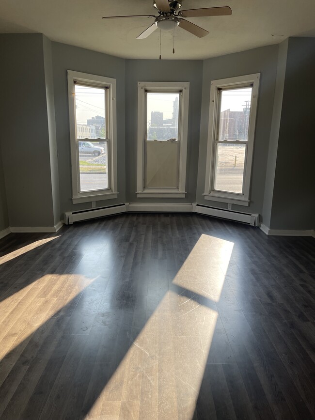 living room, window to be replaced - 319 N Pierce St