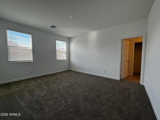 Building Photo - 5835 E Freesia Ln