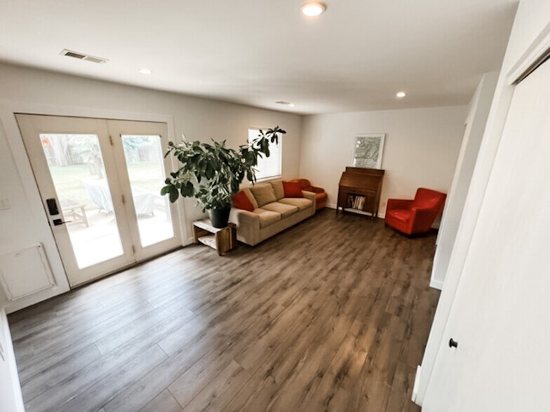 Den. These french patio opens up to ground level back yard. Furniture not included - 649 Foxtail St