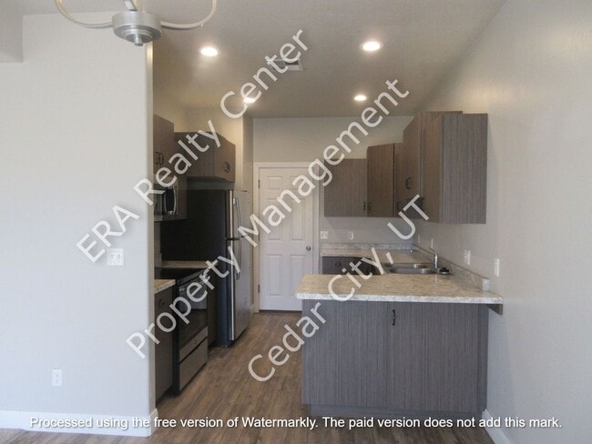 Building Photo - Move In Discount -3 bed 2.5 bath - Newer townhome in the heart of Cedar City!