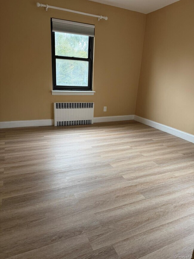 Building Photo - 40-12 209th St