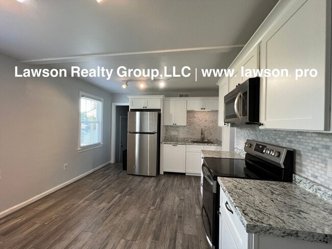 Building Photo - Updated, Cozy, and Clean- One Level Living...