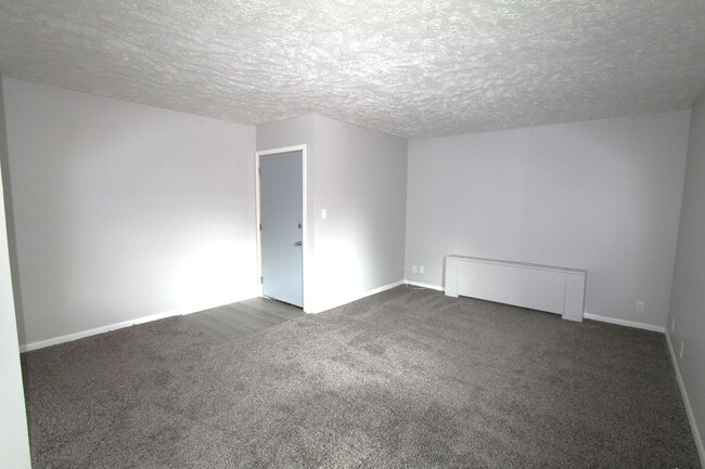 Building Photo - First Floor Two bedroom duplex with Garage...