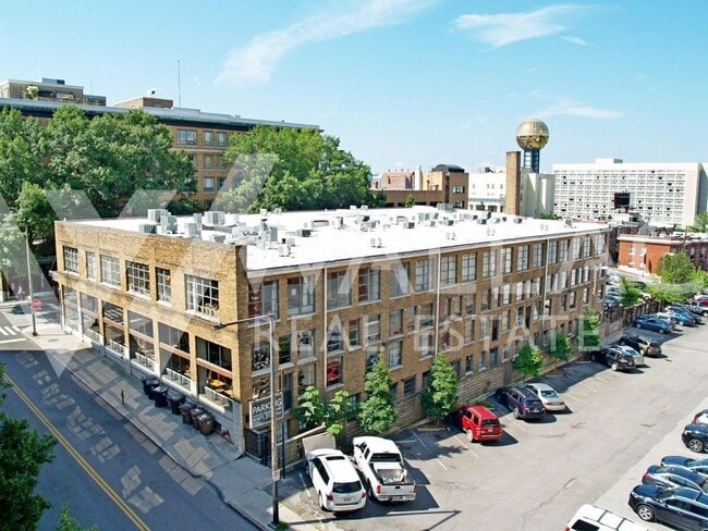 Building Photo - DOWNTOWN LIVING WITH PRIVATE GATED ENTRANC...