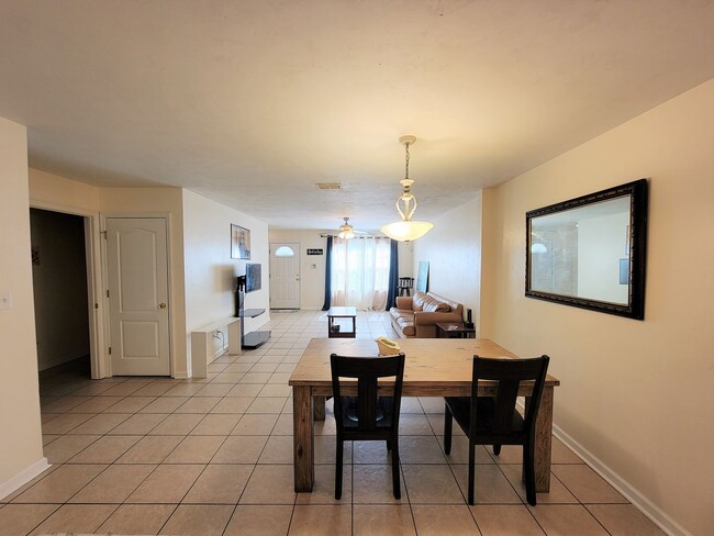 Building Photo - Large 4 bedroom town home with ceramic tile for rent right away for $1650