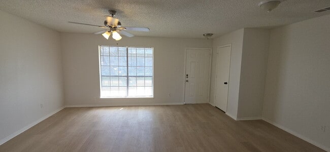 Building Photo - First-floor condo with fenced in backyard!