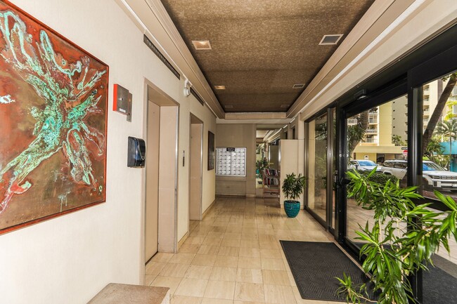 Building Photo - Aloha Towers - 2 bedroom, 2 bath corner unit with 1 covered parking stall