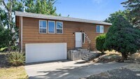 Building Photo - Charming 4-Bedroom Home with Garden – Avai...