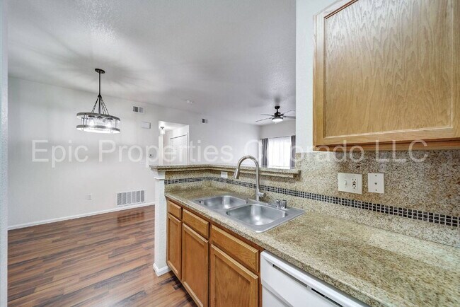 Building Photo - First Floor Corner 2 bed/2bath unit by Buckley SFB! Deeded Parking Right in Front!