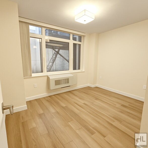 Building Photo - Beautiful 1-Bedroom Apartment — Modern Fin...