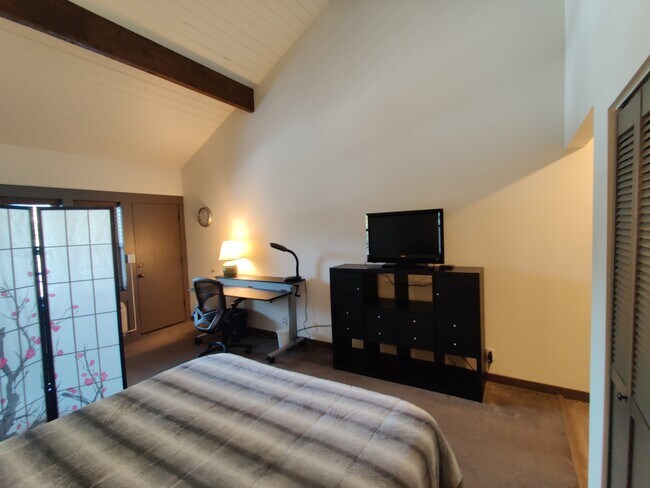 Workstation and TV - 18575 SW Century Dr