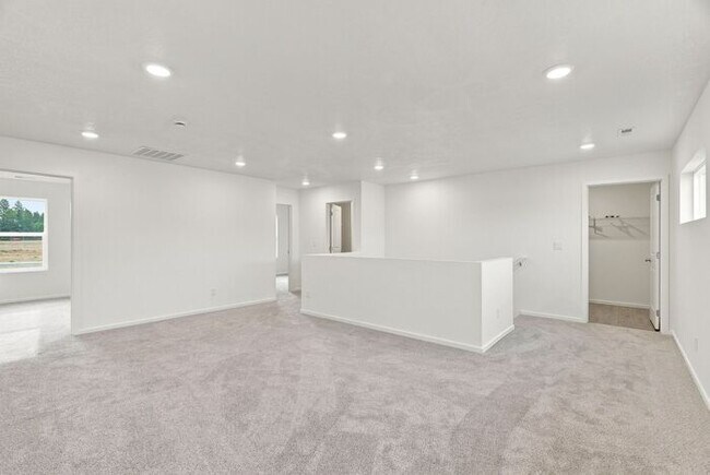 Building Photo - Spacious 5-Bedroom with Loft with 3-Car Garage