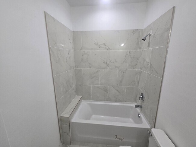 Building Photo - BRAND NEW THREE BEDROOM, 2 BATH, 1 CAR GAR...